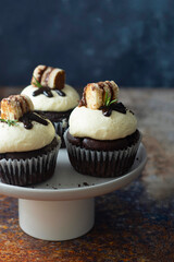 Chocolate cupcakes with butter cream. Sweet dessert, bakery, pastry dessert.
