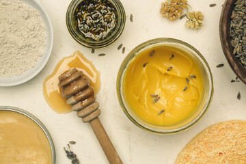 Natural homemade organic cosmetic. Creams and balms with herbal ingredients, top view.	