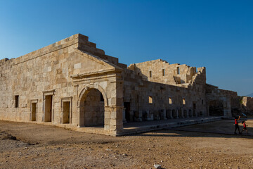 Fototapeta premium Patara (Pttra). Ruins of the ancient Lycian city Patara. Amphi-theatre and the assembly hall of Lycia public. Patara was at the Lycia (Lycian) League's capital. Aerial view shooting. Antalya, TURKEY