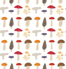 Vector seamless pattern of hand drawn doodle sketch colored mushroom isolated on white background