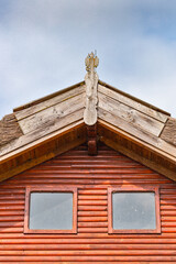 Beautiful wooden decoration on the traditional fronton house in Danube Delta region