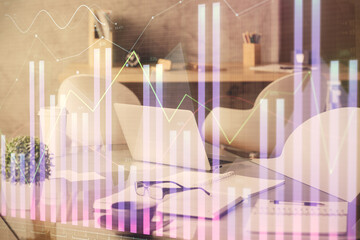 Double exposure of stock market graph drawing and office interior background. Concept of financial analysis.