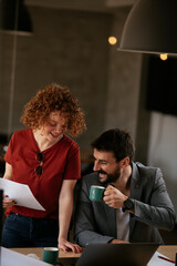 Businessman and businesswoman in office. Businesswoman and businessman working on the project..