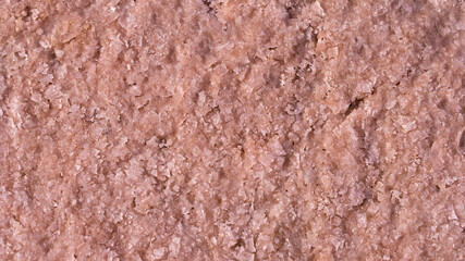 Pink salt crystal texture, rough surface of the plate