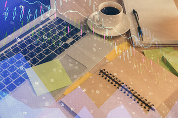 Multi exposure of forex graph drawing and desktop with coffee and items on table background....