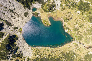Scenic view of the valley with a blue lake and mountains, in summer, Bulgaria. Mountain lakes...