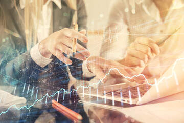 Double exposure of man and woman working together and forex chart hologram. Business concept. Computer background.