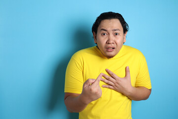 Asian Man Pointing Himself with Unhappy Expression