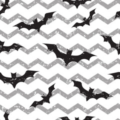 Halloween seamless pattern with bats on wave grunge print. Vector illustration