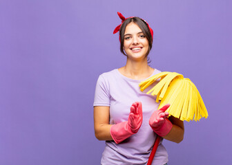 young pretty woman feeling happy and successful, smiling and clapping hands, saying congratulations...