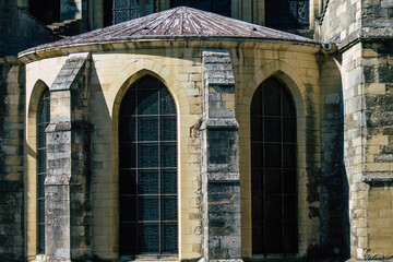View of the exterior facade of the Basilica of Saint-Remi, a medieval abbey church in Reims, a historical monument in the Grand Est region of France  
