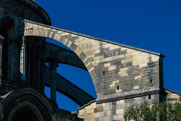 View of the exterior facade of the Basilica of Saint-Remi, a medieval abbey church in Reims, a...