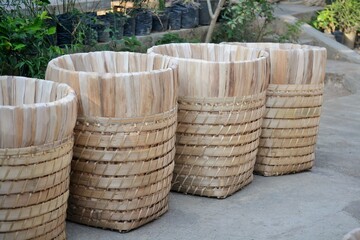 some traditional Indonesian tobacco baskets on the floor