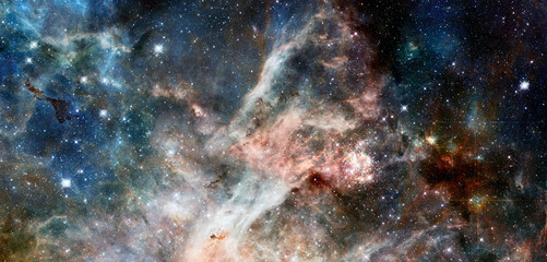 Spiral nebula and light ray in deep space. Elements of this image furnished by NASA