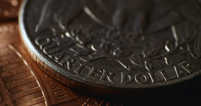 Macro close up of US quarter coin with shining light