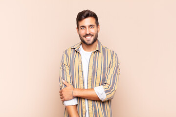 young man laughing shyly and cheerfully, with a friendly and positive but insecure attitude