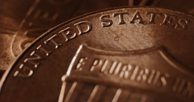 Macro close up of US one cent coin with shining light