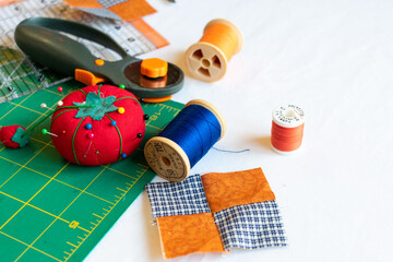 orange and blue quilting supplies