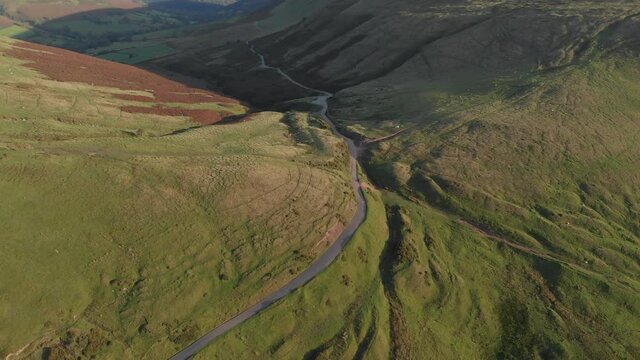 Drone shot of winding road in Brecon Beacons National Park, Wales