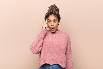 young afro woman feeling sad and whiney with an unhappy look, crying with a negative and frustrated...