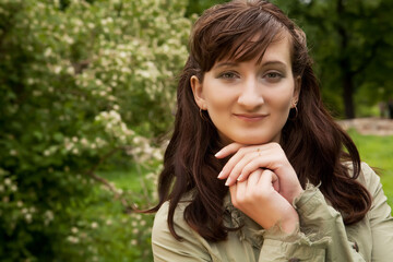Beautiful young woman relaxing at park