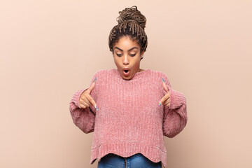 young afro woman feeling frustrated and annoyed, sick and tired of failure, fed-up with dull,...