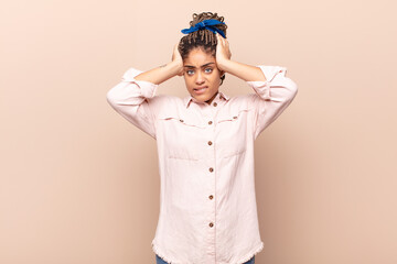 young afro woman feeling frustrated and annoyed, sick and tired of failure, fed-up with dull,...