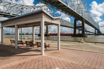 Interstate 10 Twin Span bridge over the Mississippi River in New Orleans, Louisiana with a cargo...