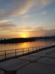 Obraz premium sunset over the river
