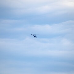 Helicopter flying high over Sydney harbour Australia