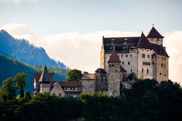 Fototapeta na wymiar Picturesque summer landscape with Gutenberg Castle, important historic preserved castle located in town of Balzers, Principality of Liechtenstein