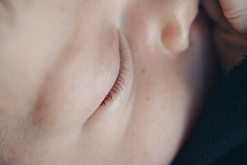 eye of newborn baby close up. The concept of hygiene and health