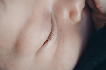 eye of newborn baby close up. The concept of hygiene and health