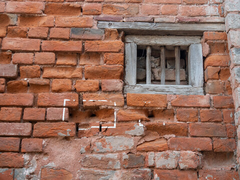 window and bullet marks on a wall at jallianwala bagh massacre site in amritsar