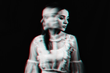 abstract portrait of a Ghost girl in a white dress on a dark background with blurred