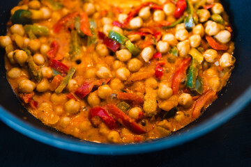 plant-based food, vegan chickpeas red pesto stew with capsicums and spices