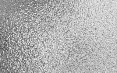 Silver gray foil paper texture background.