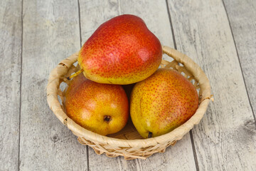 Pear heap in the wooden basket