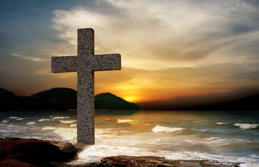 Crucifix crucifixion jesus christ at sea with sunset background