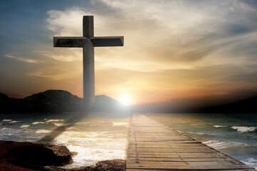 Crucifix crucifixion jesus christ at sea with sunset background