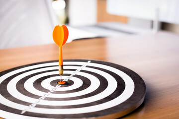 Dart is an opportunity and Dartboard is the target and goal.So both of that represent a challenge...
