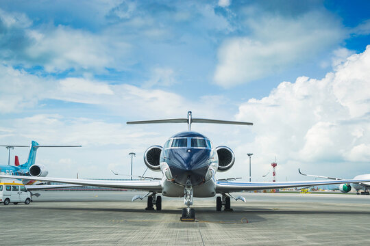 Private business jet parking at parking stand 