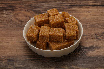 Cane sugar cubs in the bowl