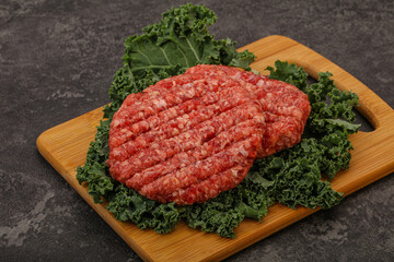 Raw beef burger cutlet for cooking