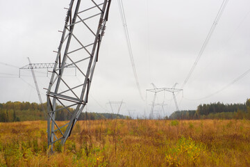 Power line support, close-up photo. High voltage power transmission. Metal construction. In the...