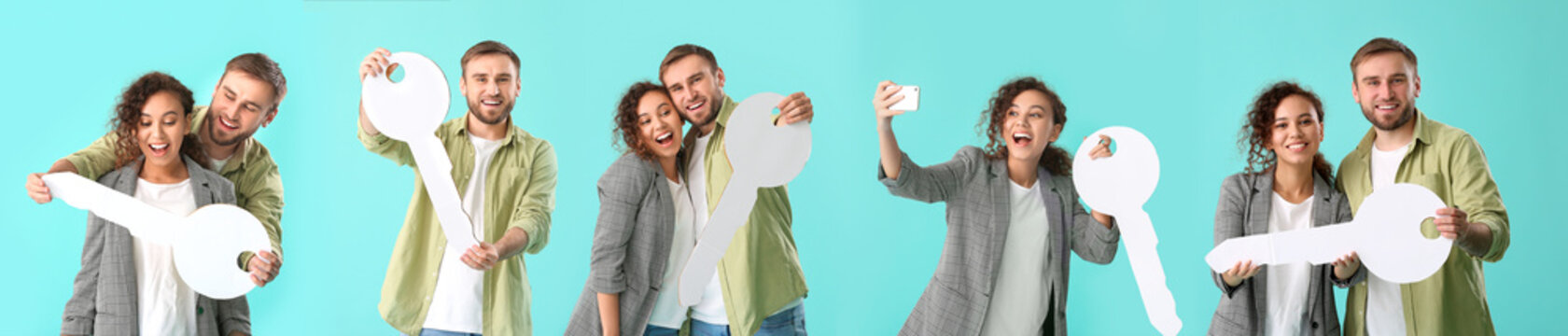 Happy young couple with big paper key on color background