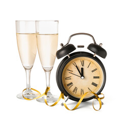 Alarm clock and glasses of champagne on white background. Christmas time
