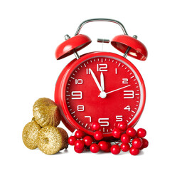 Alarm clock and Christmas decor on white background