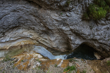 small canyon with rushing water