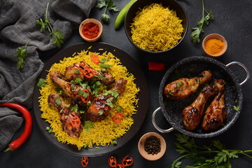 Tandoori chicken with fresh chicken dough and crispy Indian spices and yellow wild rice cooked with curcuma turmeric spice